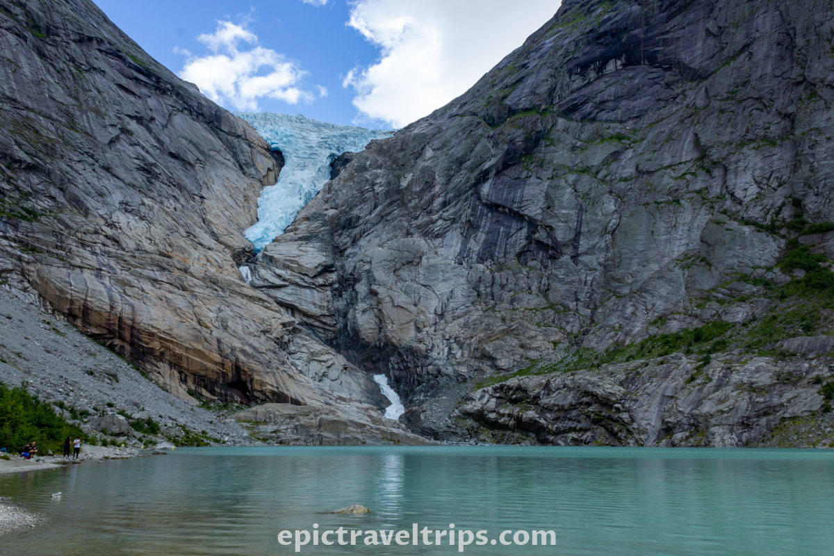 Briksdals Glacier with lake and snowy mointains