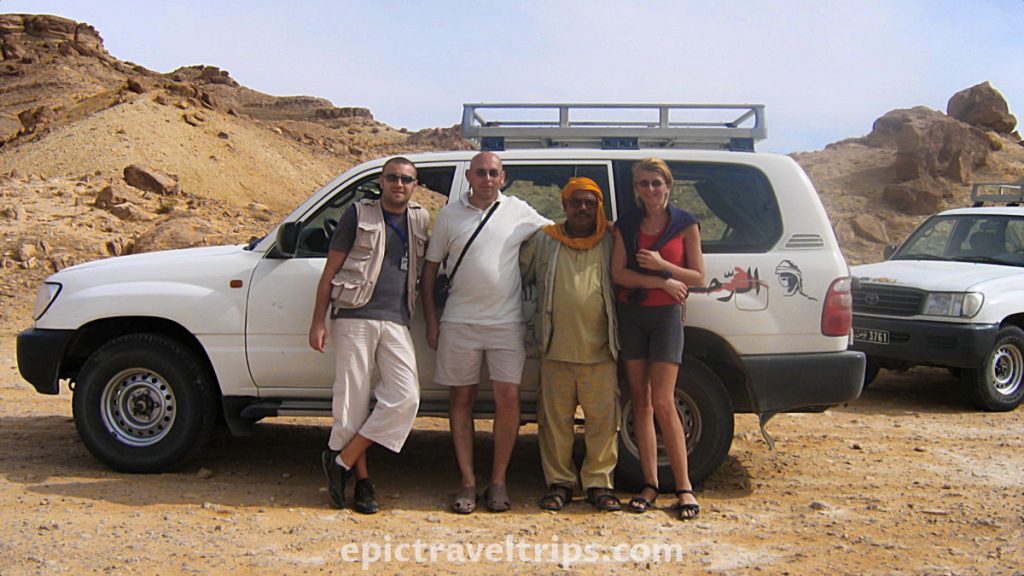 People in front of the Sahara tour jeep. Part of our Adventurous Three Days Epic Sahara Tour In Amazing Tunisia With Hidden Gems.