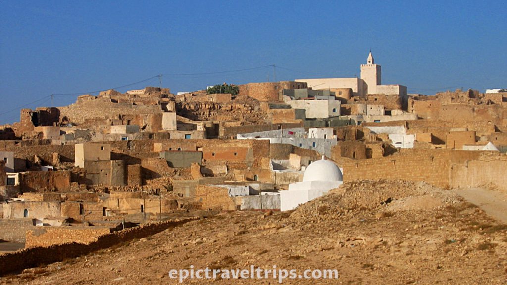 Tamezret small place on the desert hill in Tunisia. Small houses on the hill. Part of our Adventurous Three Days Epic Sahara Tour In Amazing Tunisia With Hidden Gems.