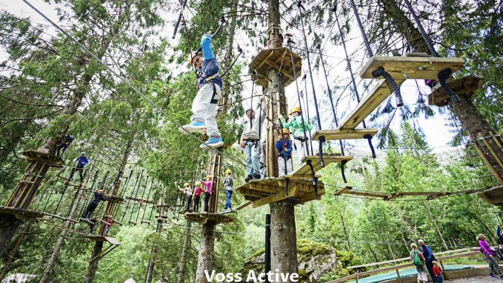 Kids in the high rope park have fun near Voss in Norway.