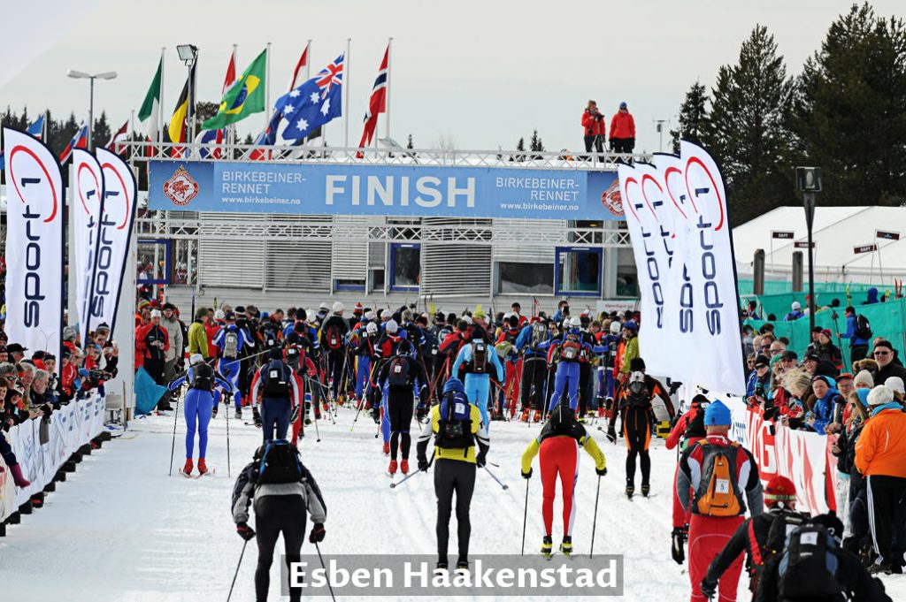 Ski racers at the finish line in the Birkebeiener race from Rena to Lillehammer in Norway.