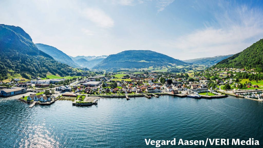 Aerial view of Vik village at the Sognefjord with mountains in the background in Norway.