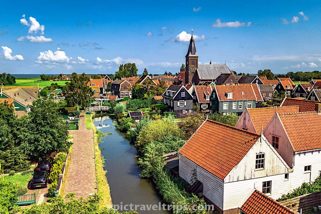 Grote Church at Marken Village with colorful houses in The Netherlands
