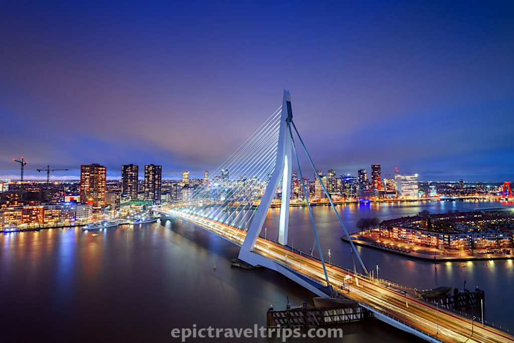 Erasmus Bridge and Rotterdam skyline during the night in The Netherlands.