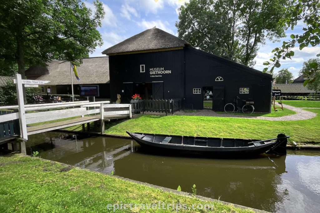 The museum with punt boat on the canal at Giethoorn Village in The Netherlands