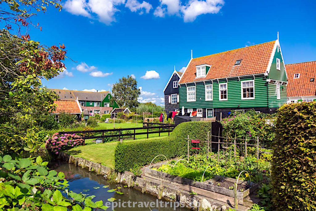 Colorful houses with beautiful gardens at Marken village in The Netherlands.