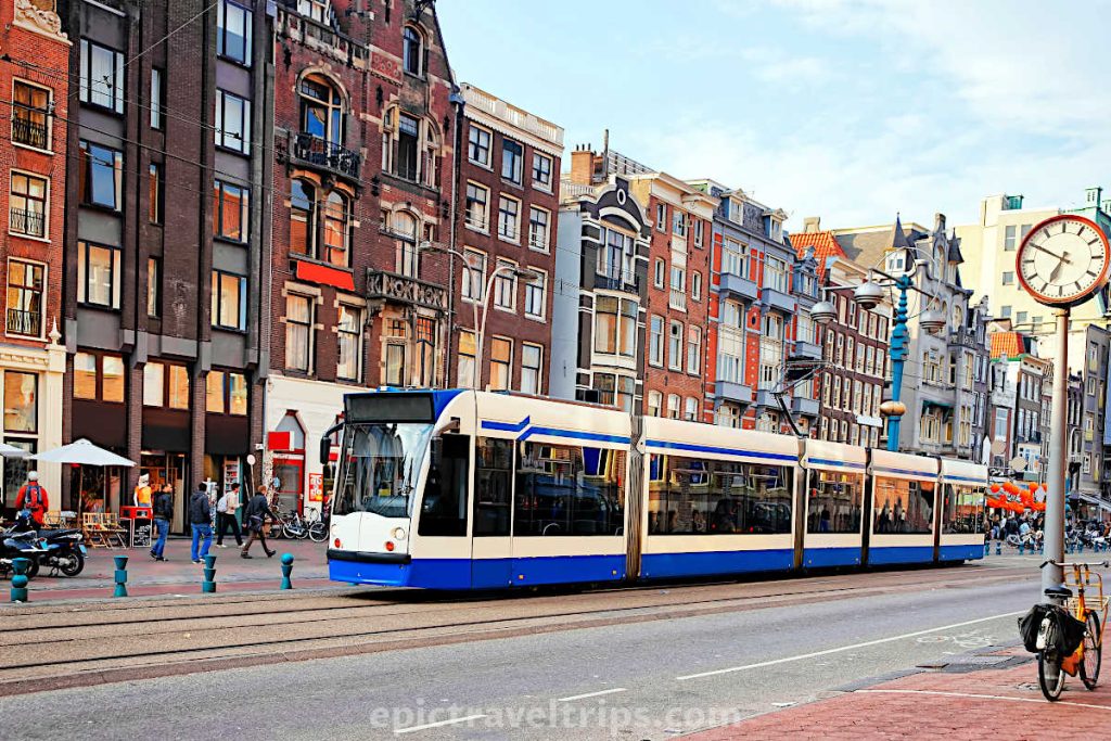 Tram on the streets at Amsterdam in The Netherlands.