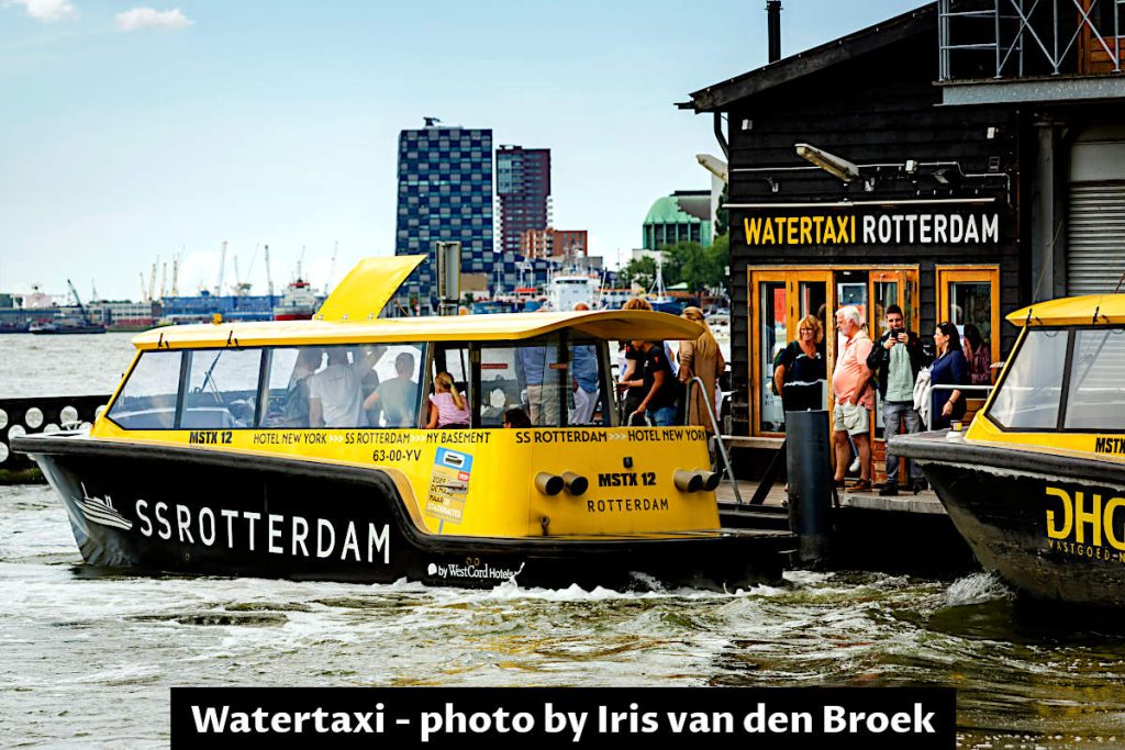 Yellow-black water taxi at Rotterdam port in The Netherlands.